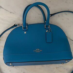 Blue COACH leather dome crossbody with silver accents